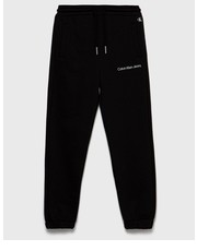 Spodnie spodnie dresowe dziecięce kolor czarny gładkie - Answear.com Calvin Klein Jeans