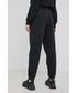 Spodnie Reebok Spodnie damskie kolor czarny z nadrukiem