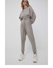 Spodnie spodnie damskie kolor beżowy gładkie - Answear.com Reebok