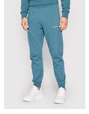 Spodnie męskie Spodnie dresowe Micro Logo K10K109940 Niebieski Relaxed Fit - modivo.pl Calvin Klein 