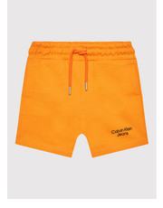 Spodnie Szorty sportowe Stacked Logo IB0IB01180 Pomarańczowy Relaxed Fit - modivo.pl Calvin Klein Jeans